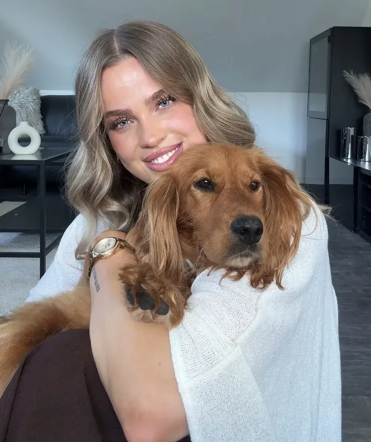 Michelle with her golden retriever